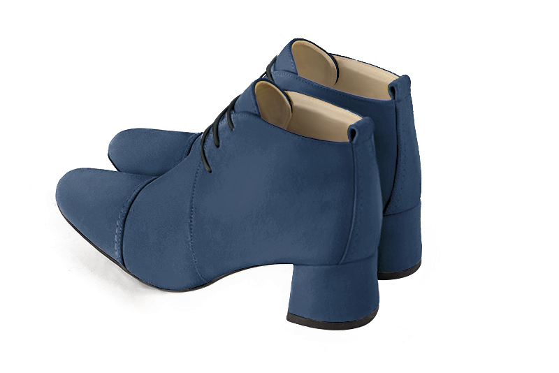 Denim blue women's ankle boots with laces at the front. Round toe. Low flare heels. Rear view - Florence KOOIJMAN